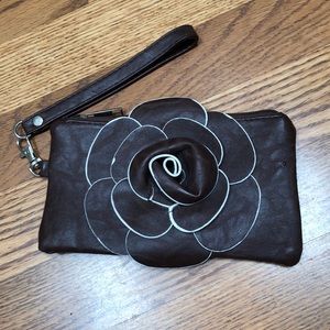 Brown Vegan leather wristlet with flower appliqué